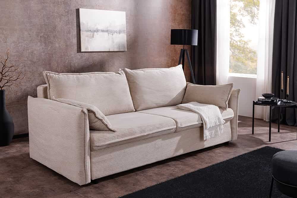 Design slaapbank APARTMENT – Comfortabele 3‑zits bank met verborgen bed in stijlvol beige corduroy