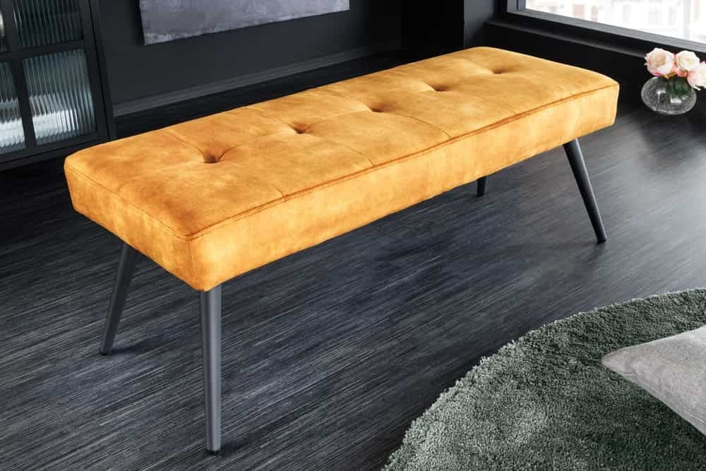 Designbank BOUTIQUE 100 cm – mosterdgeel fluweel met zwarte metalen poten