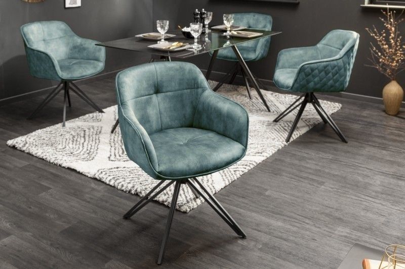 Draaibare designstoel EUPHORIA in petrol fluweel met zwarte metalen poten – modern comfort voor de eetkamer