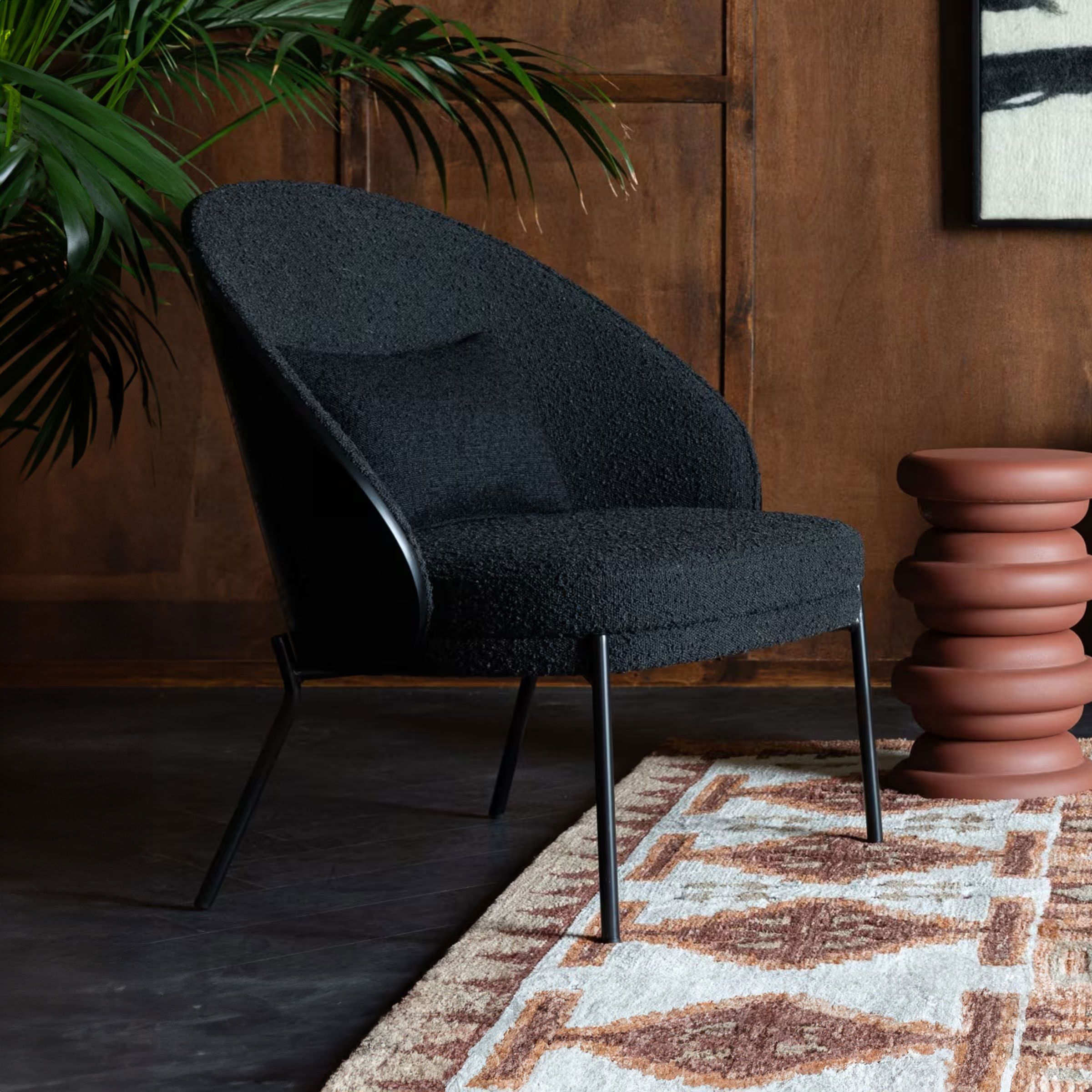 Dutchbone Rodin Fauteuil – Zwart Essenhout & Bouclé voor een Retro‑Moderne Sfeer