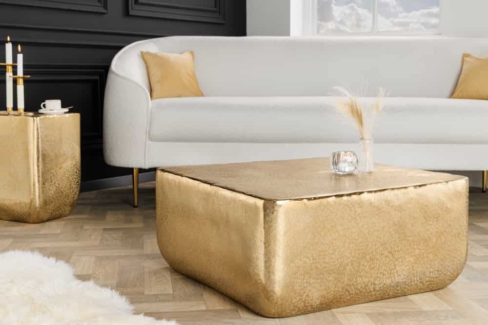 Handgemaakte gouden salontafel UNIT – stijlvolle blikvanger van Invicta Interior