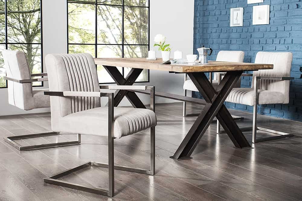 Moderne sledefauteuil BIG ASTON – Steengrijs en geborsteld RVS voor een tijdloos eetkamerinterieur