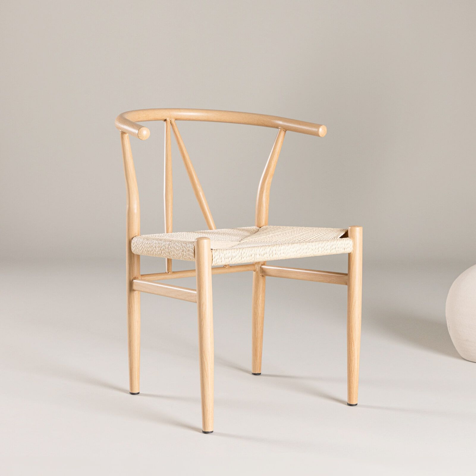 Nohr Atalie Eetkamerstoel – Elegante rattan met zwart staal