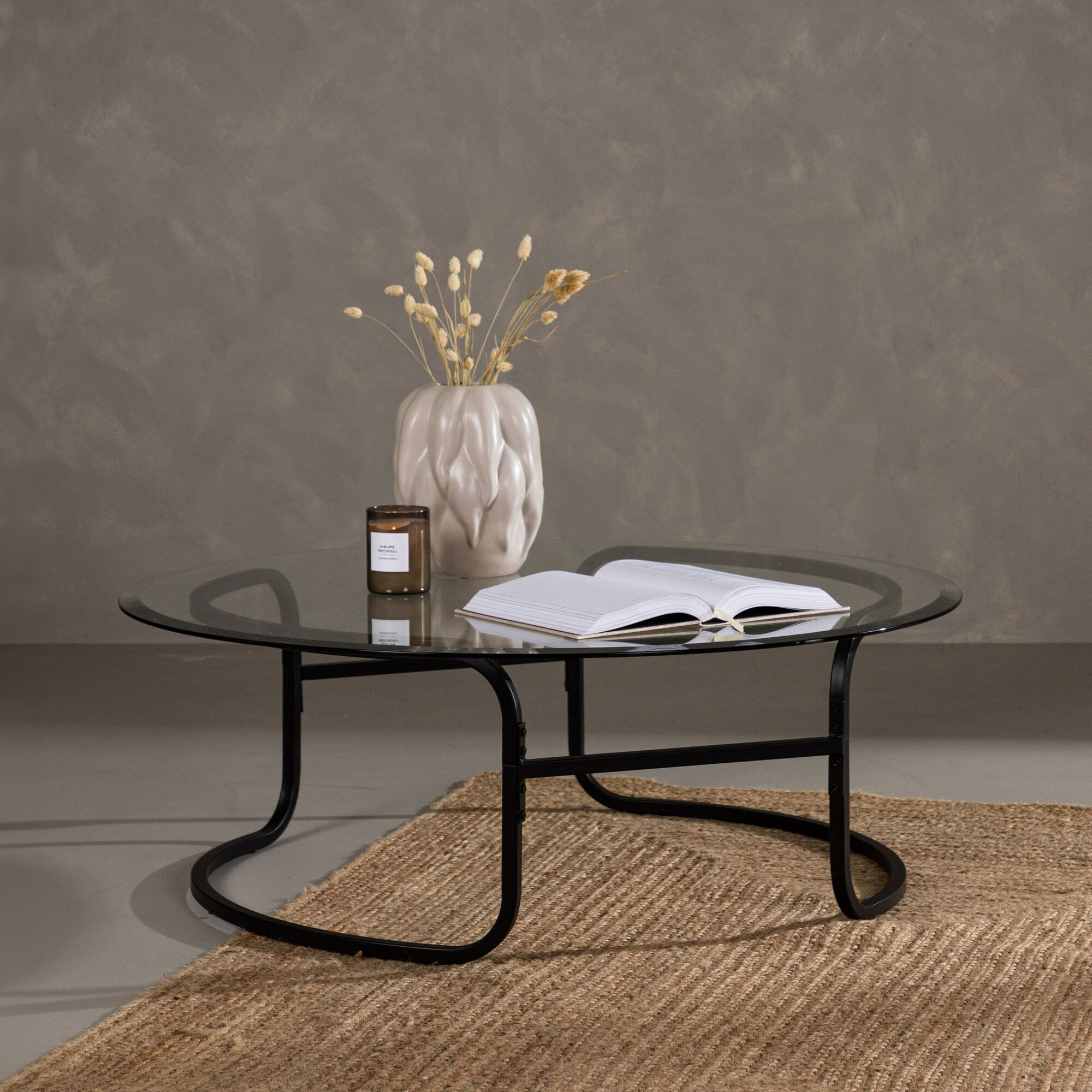 Nohr ronde salontafel Myron – strak glas met zwart stalen onderstel, 110 cm