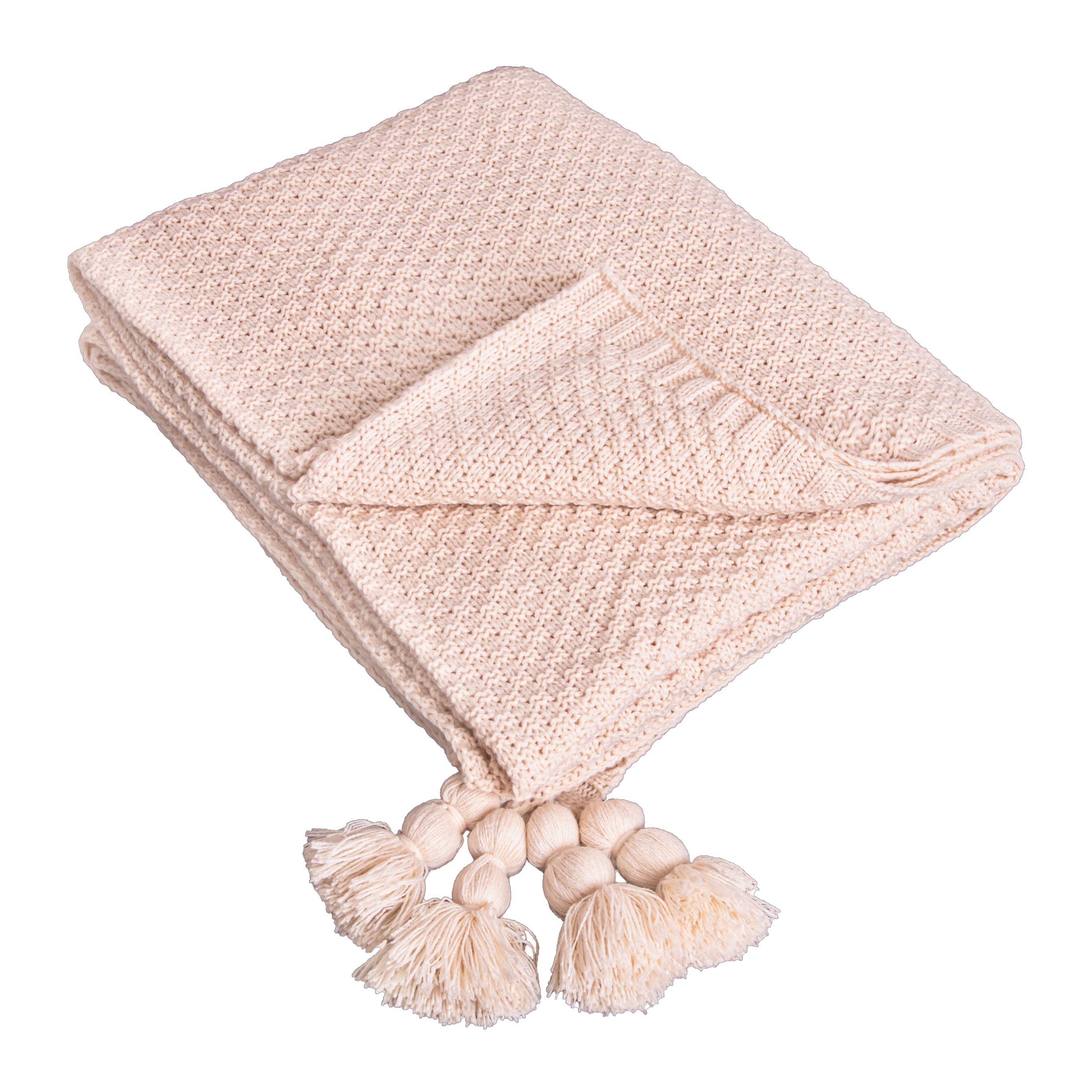 Quvoï Beige Plaid met Kwastjes – Comfort en Stijl voor elk Interieur